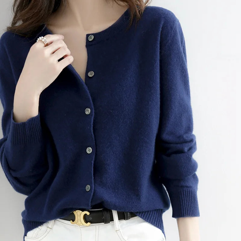 Classic women's long sleeve cardigan sweater. Button-up design for cozy, elegant layering in fall & winter.