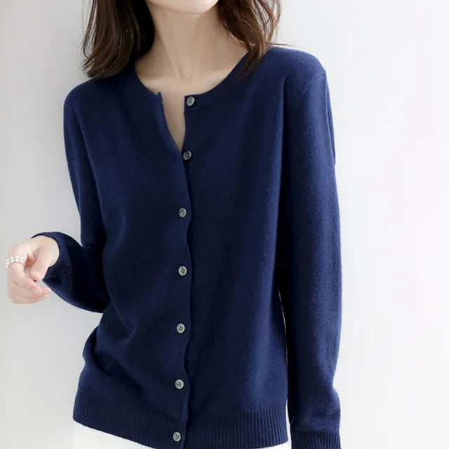 Versatile women's button-up cardigan. Cozy knit sweater, ideal for stylish layering in cool fall & winter weather.