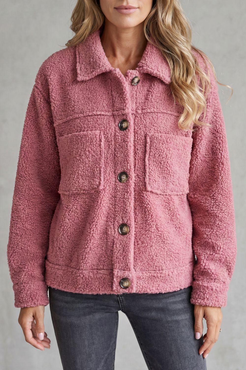 Comfortable women's button-up jacket, a stylish layering piece for casual everyday fashion.