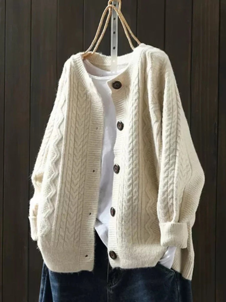 Elegant women's soft knit cardigan with classic cable pattern & button front closure, ideal for winter.