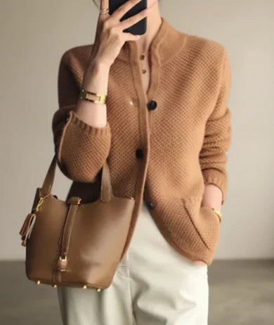 Women's cozy cable knit cardigan with button front, long sleeves. Perfect for casual layering or outerwear.
