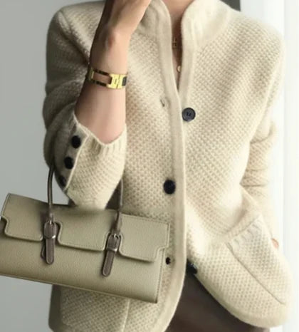 Stylish women's button-front cable knit sweater. Warm, long-sleeve cardigan for casual wear & layering.