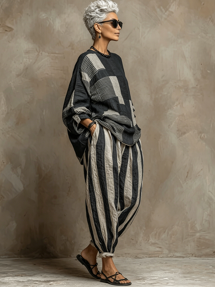 Striped trousers from a women's cozy two-piece loungewear set, perfect for relaxed winter outfits.