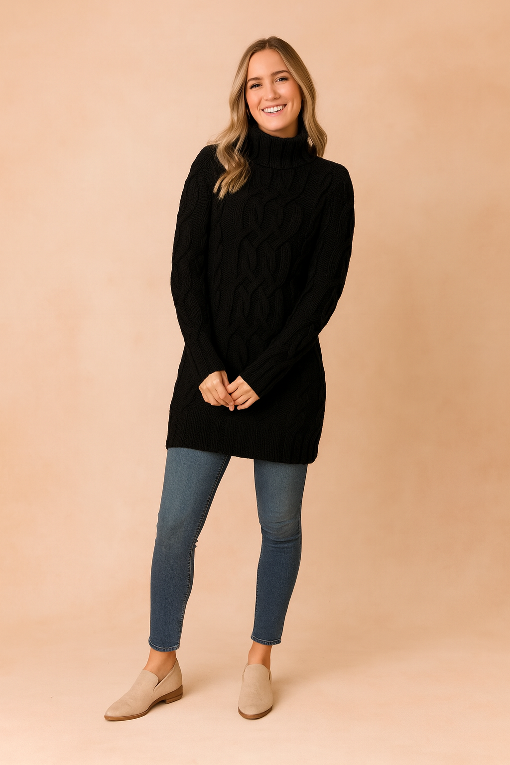 Close-up of a warm, soft women's cable knit turtleneck pullover dress in beige