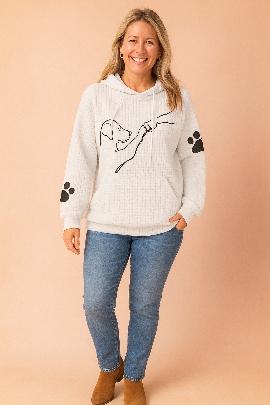 Women's pullover hoodie featuring a playful dog print. Cozy, long-sleeve top for pet owners and animal enthusiasts.