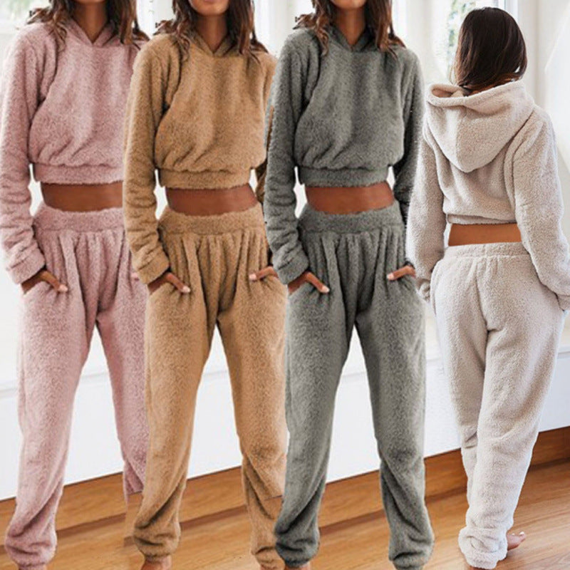 Women's cozy fleece lounge set with hoodie and pants for ultimate comfort.