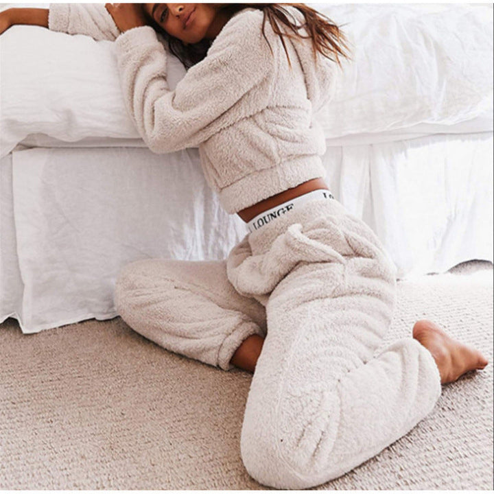 Women's casual fleece set with a relaxed-fit hoodie and coordinating pants.
