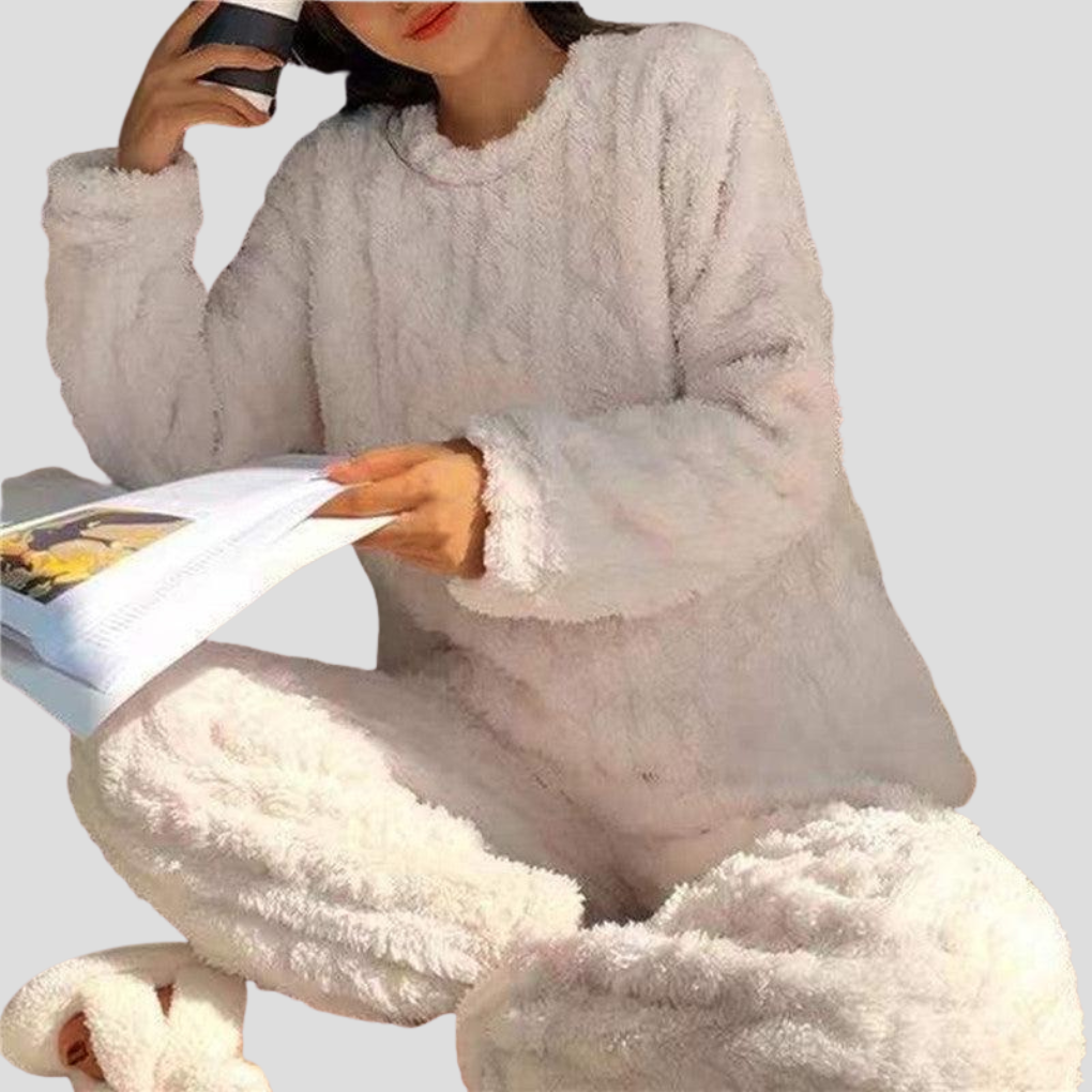 Model wearing a women's fleece pajama set, perfect for cozy loungewear.