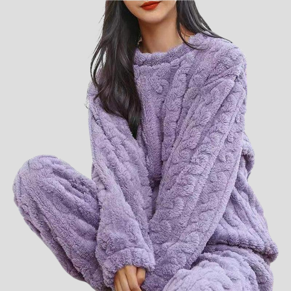 Stylish women's sleepwear: a warm and soft fleece pajama set.
