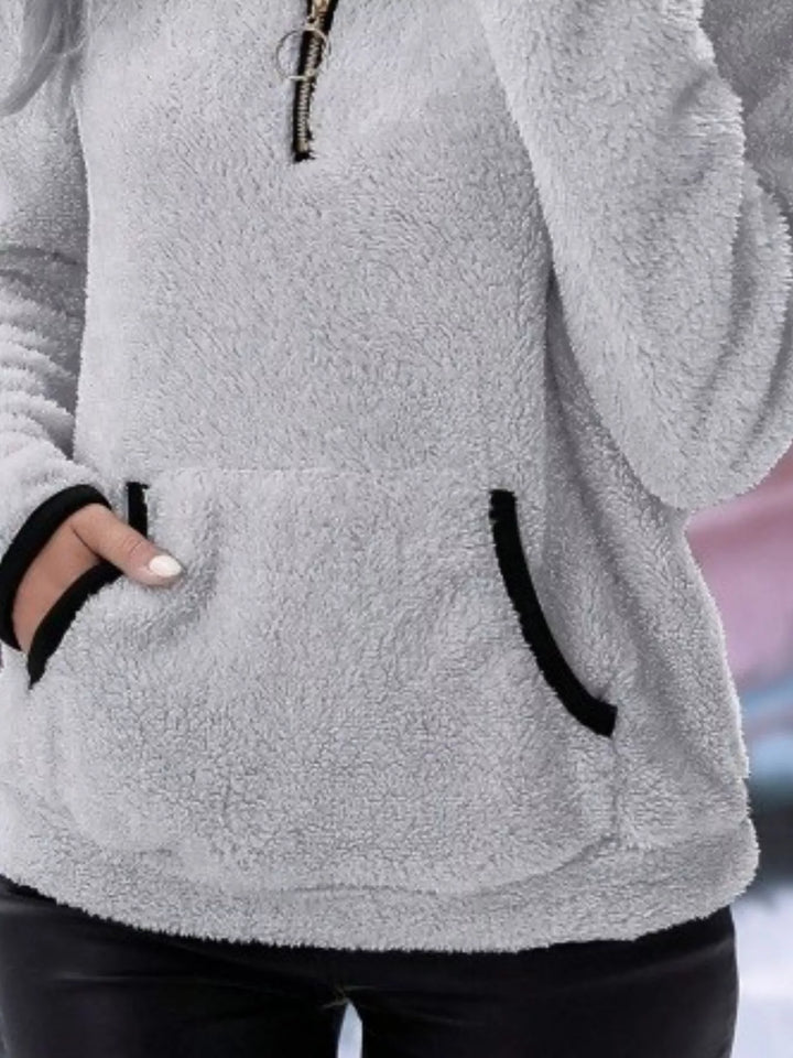 Women's half-zip sweater for everyday style, a versatile layering piece.