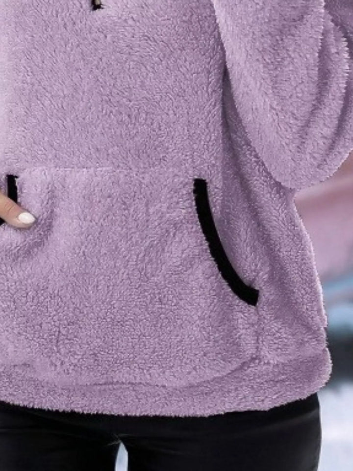 Women's casual half-zip sweater, designed for cozy comfort and winter fashion.