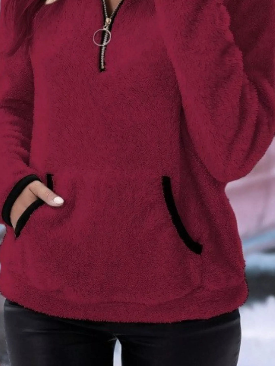 Women's half-zip pullover, a comfortable and relaxed fit for casual winter fashion.