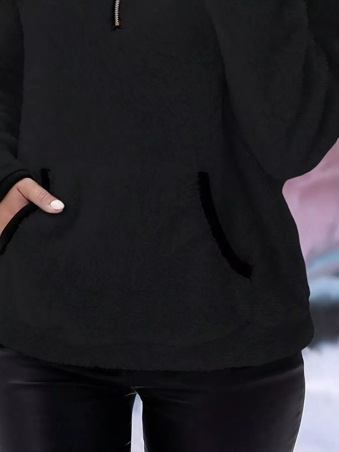 Relaxed fit women's half-zip pullover, ideal for everyday comfort and warmth.