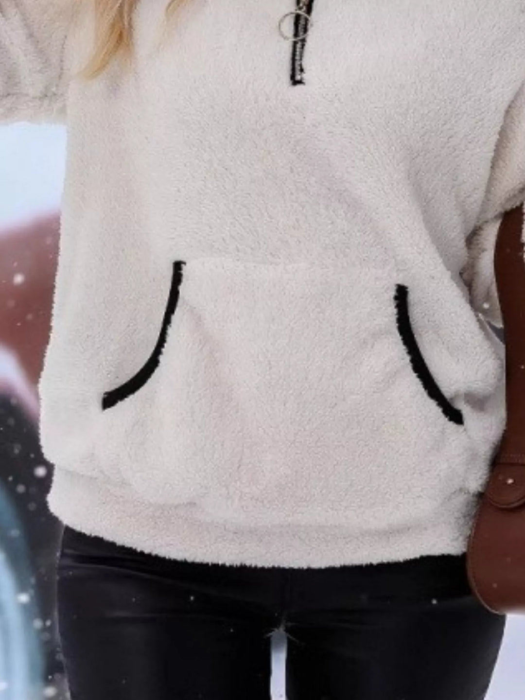 Everyday women's cozy sweater, a half-zip design for warmth and relaxed fit.