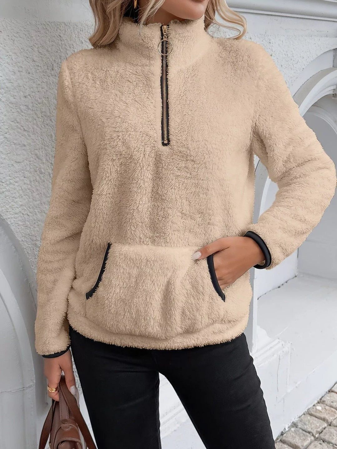 Relaxed fit women's long sleeve half-zip sweater, great for casual everyday comfort.