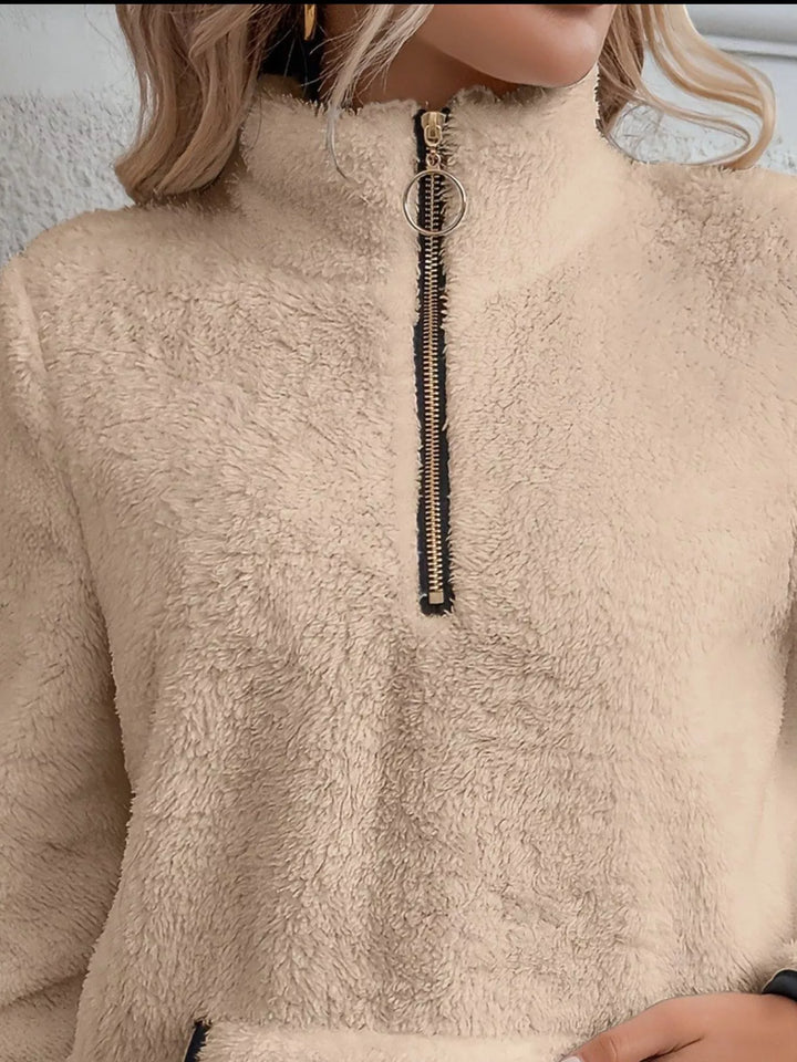 Women's half-zip pullover sweater, designed for ultimate comfort and casual wear.