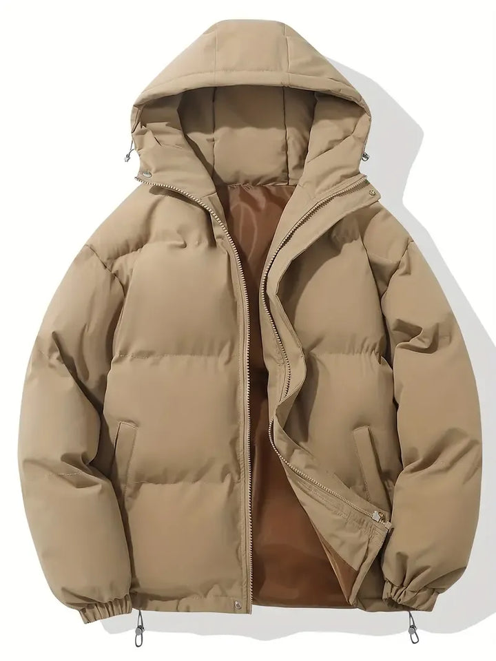 Ladies' cozy winter puffer jacket with hood. Essential cold weather outerwear for warmth & style.