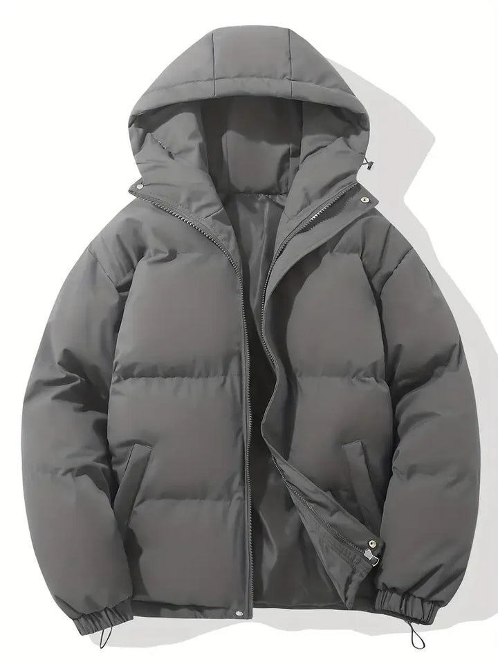 Plush women's hooded puffer jacket. Enjoy cozy winter warmth & stylish comfort in cold weather.