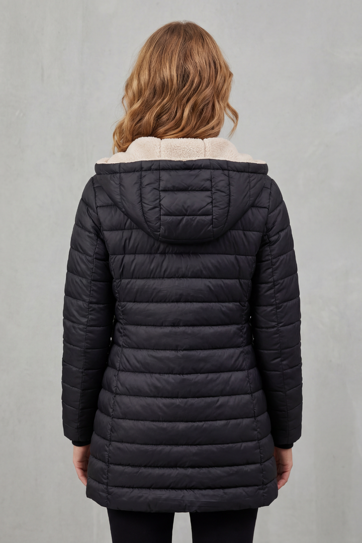 Navy blue women's hooded puffer jacket, a cozy winter coat for everyday cold weather wear.