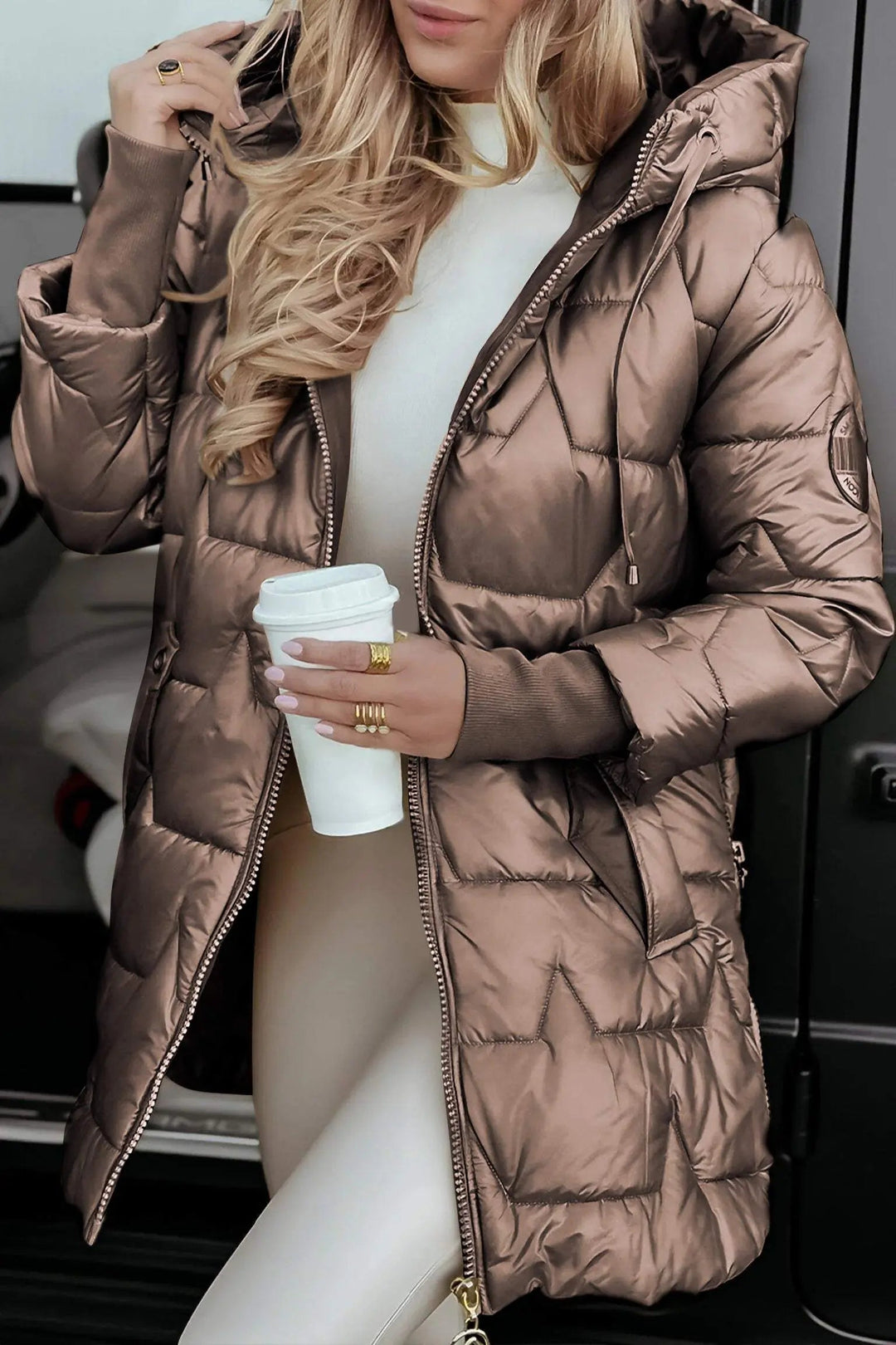 Trendy women's quilted puffer jacket with hood for ultimate fall and winter comfort and everyday casual style.