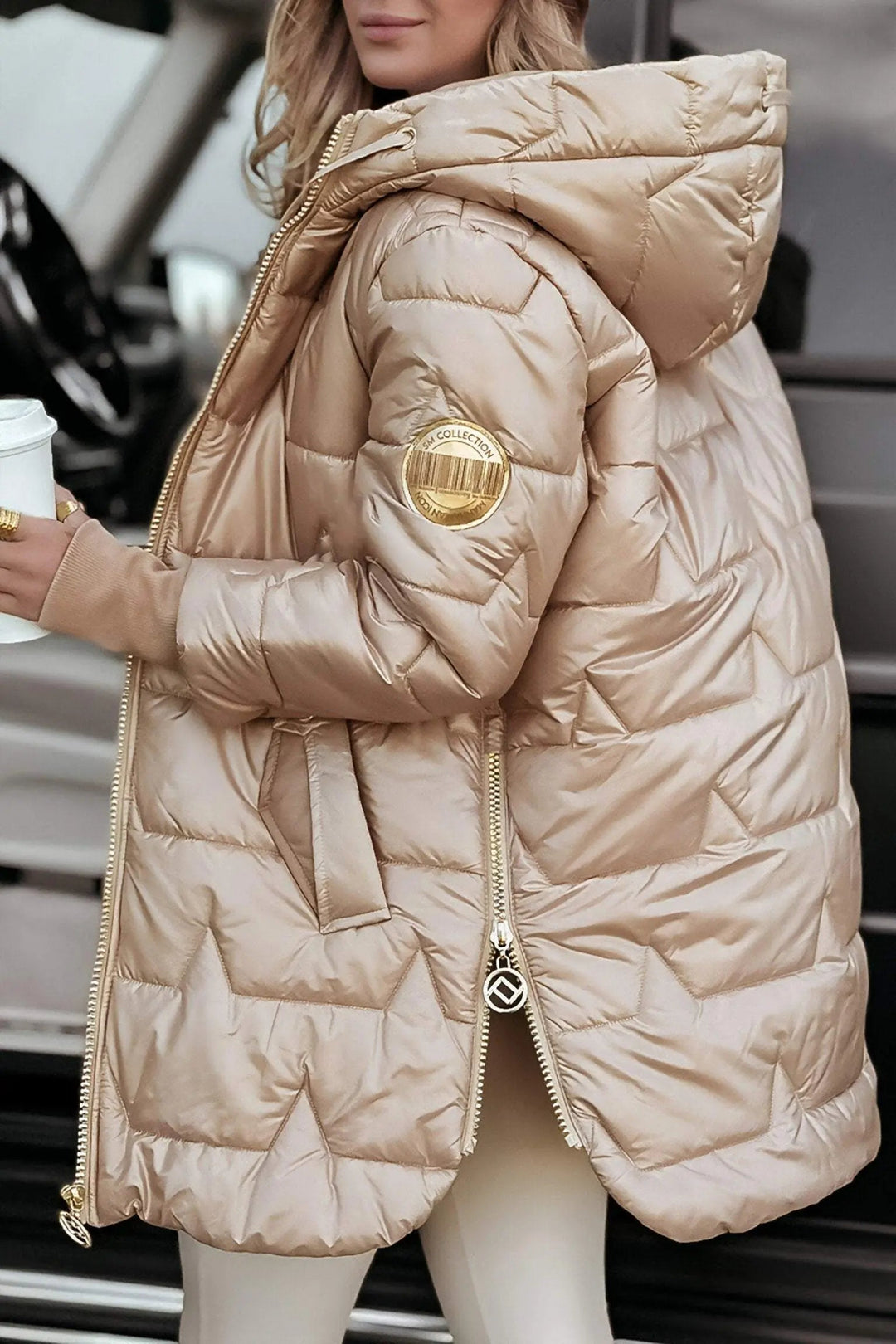 Everyday women's hooded puffer coat, providing warmth and comfort for chilly fall days and winter activities.