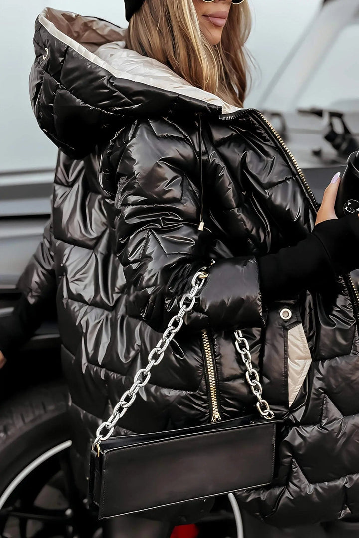 Puffy women's winter coat with hood, offering stylish and warm outerwear for cold fall and winter weather.