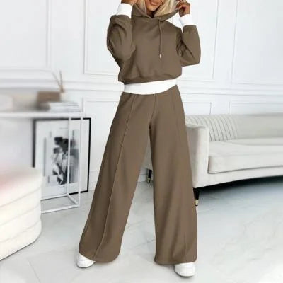 Relaxed fit women's matching outfit: cozy hoodie & wide-leg pants. Perfect for fall and winter comfortable fashion.