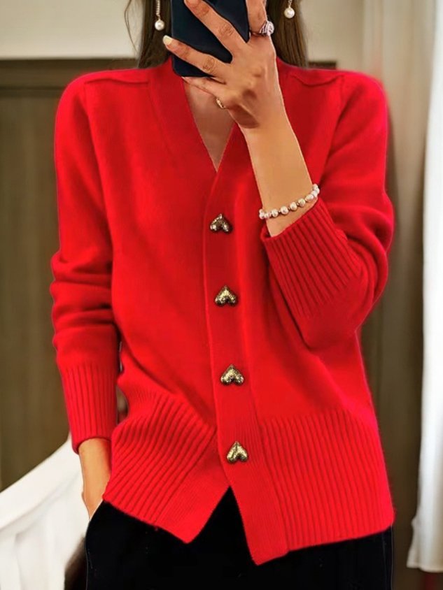 Warm & cozy women's sweater cardigan with charming heart buttons, essential for fall and winter fashion.