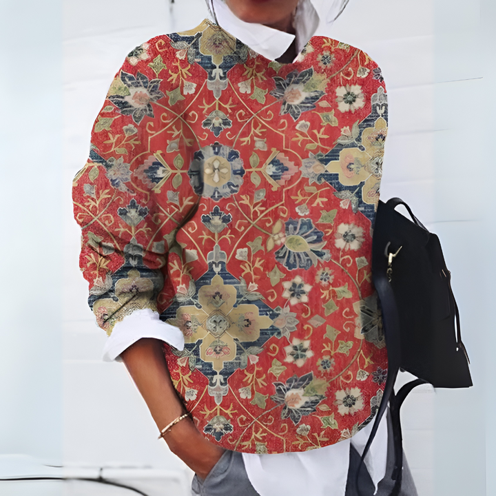 Soft knit women's long-sleeve sweater, offering a cozy and chic fit for everyday fall and winter apparel.