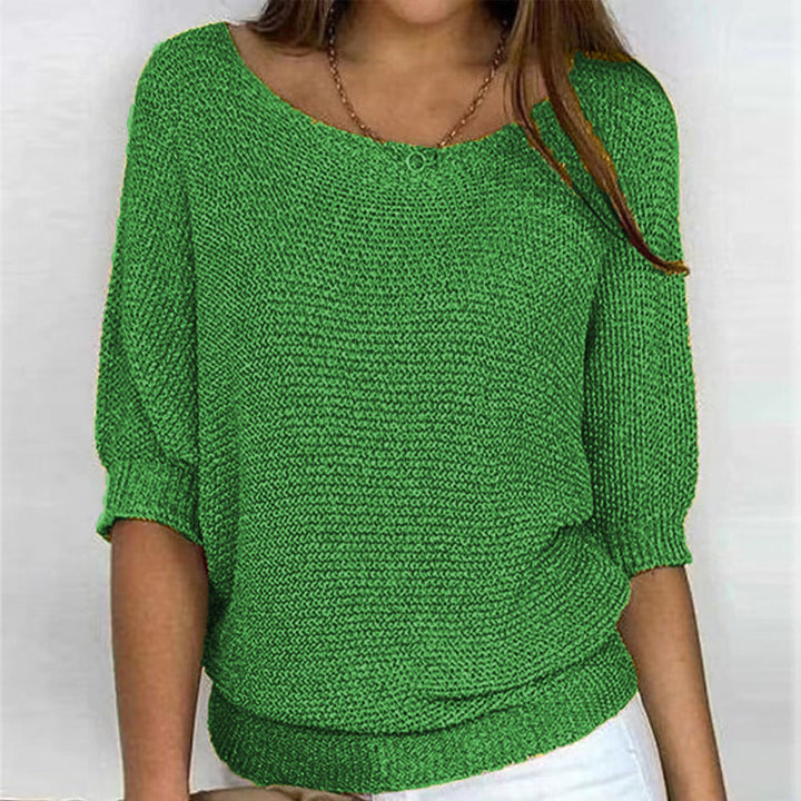Cozy knit women's long sleeve sweater. Chic, flattering design for comfortable everyday fashion.