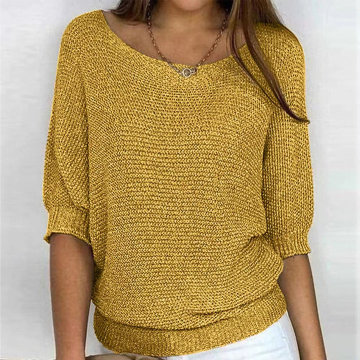 Women's long sleeve sweater, soft & cozy for casual wear. Flattering fit, perfect winter comfort.
