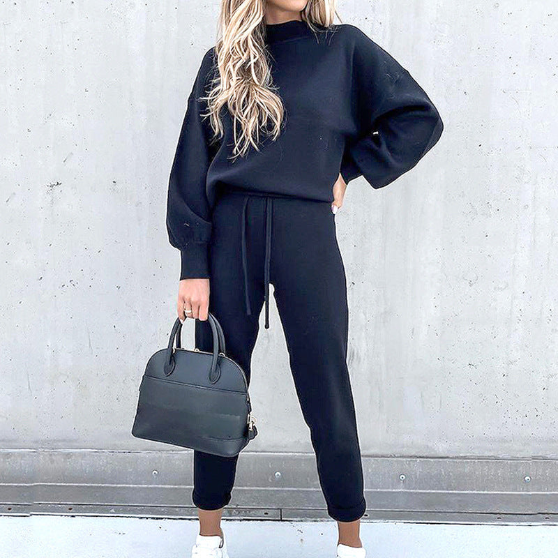 Comfortable women's two-piece sweater set, soft knit loungewear for relaxed home wear.