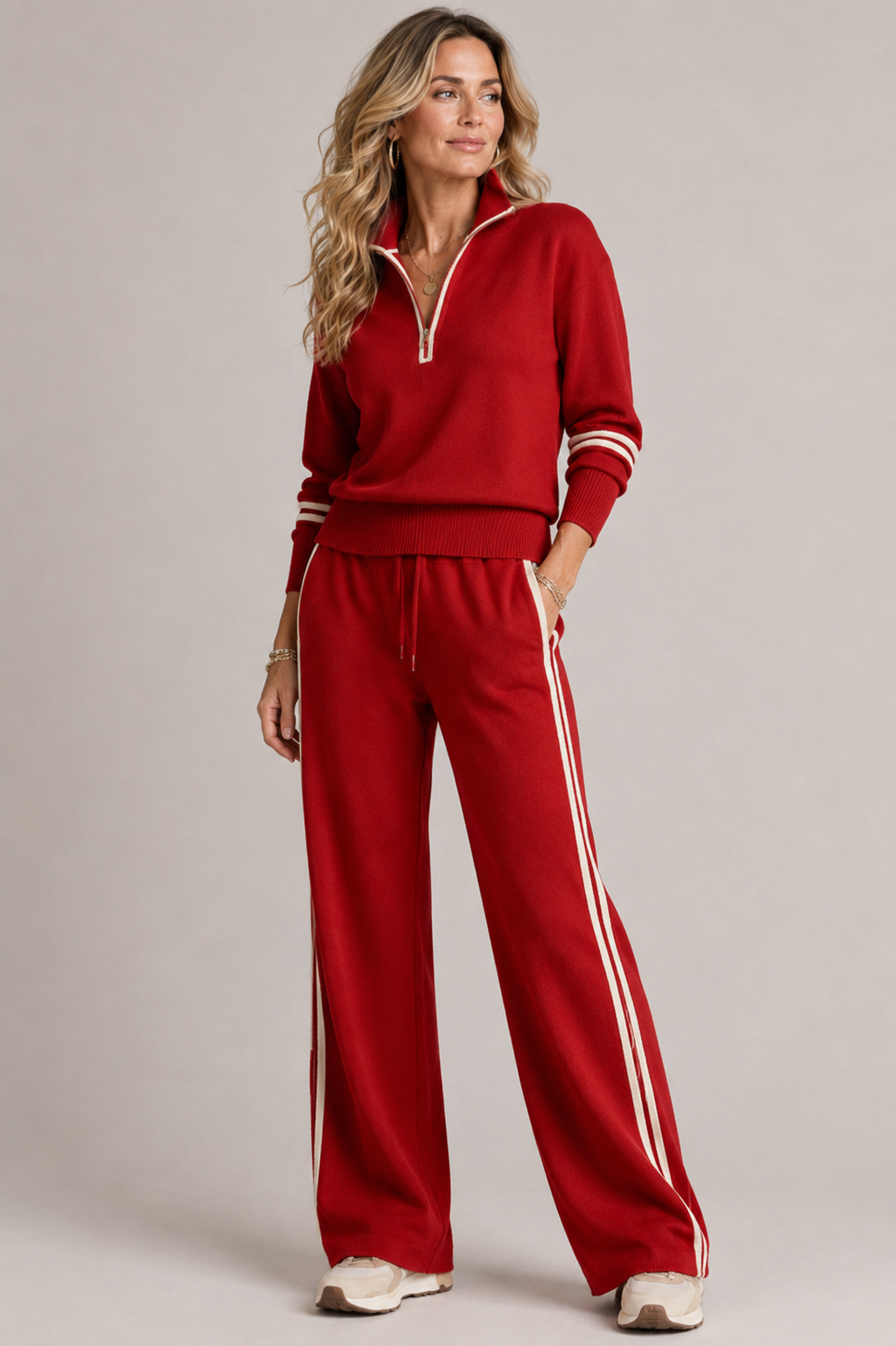 Soft knit women's two-piece set: quarter-zip top and wide-leg pants. Ideal for relaxed comfort and casual elegance.