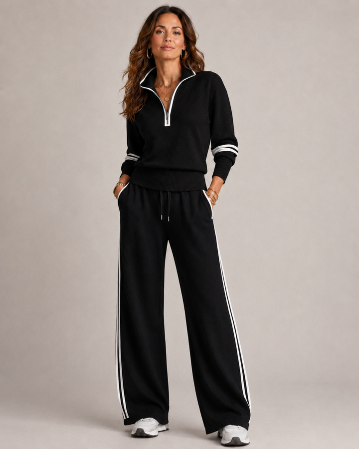Women's fall/winter knit two-piece outfit set, featuring a trendy quarter-zip top and comfy wide-leg trousers.