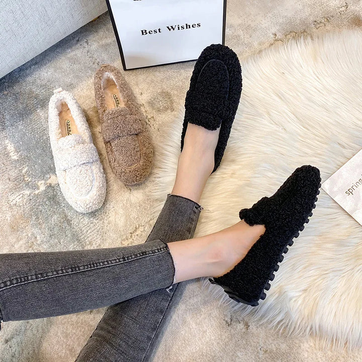 Close-up of plush Lana teddy loafers for women, showcasing soft texture, cozy warmth, and stylish design.