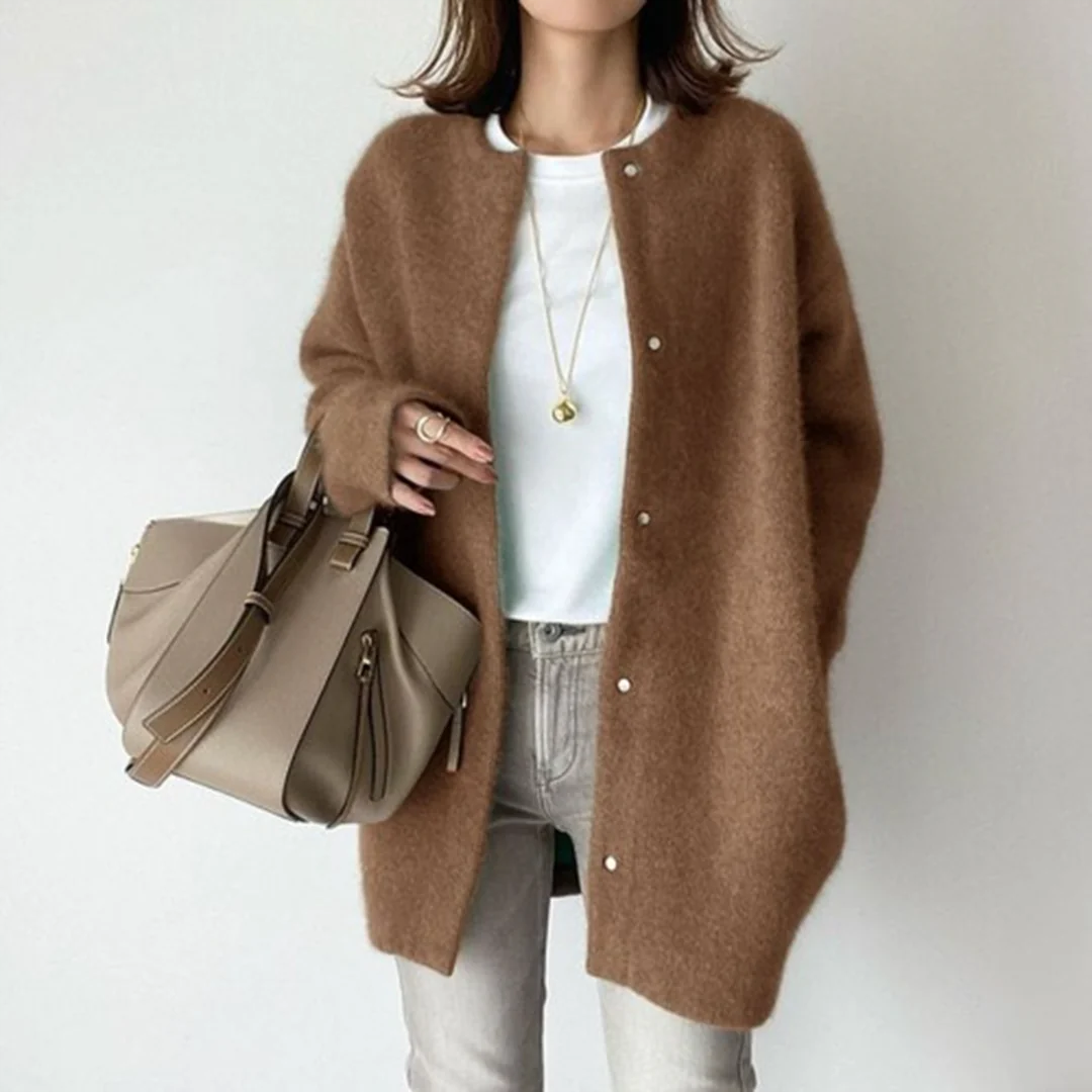Comfortable women's fall/winter long cardigan. Cozy knit oversized sweater, ideal for casual layering & everyday style.