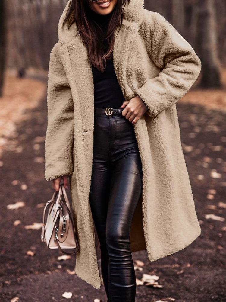 Women's cozy long hooded coat in warm teddy fabric. Perfect for winter fashion & fall outerwear.
