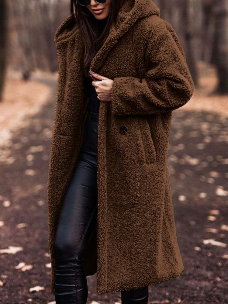 Relaxed fit women's long hooded coat, ideal fall outerwear. Cozy, warm & stylish for casual days.