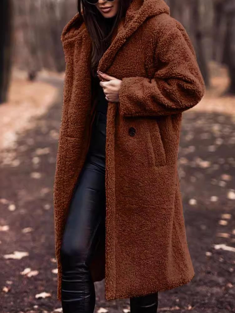 Cozy women's long hooded coat, a warm winter essential. Stylish teddy outerwear with a relaxed fit.