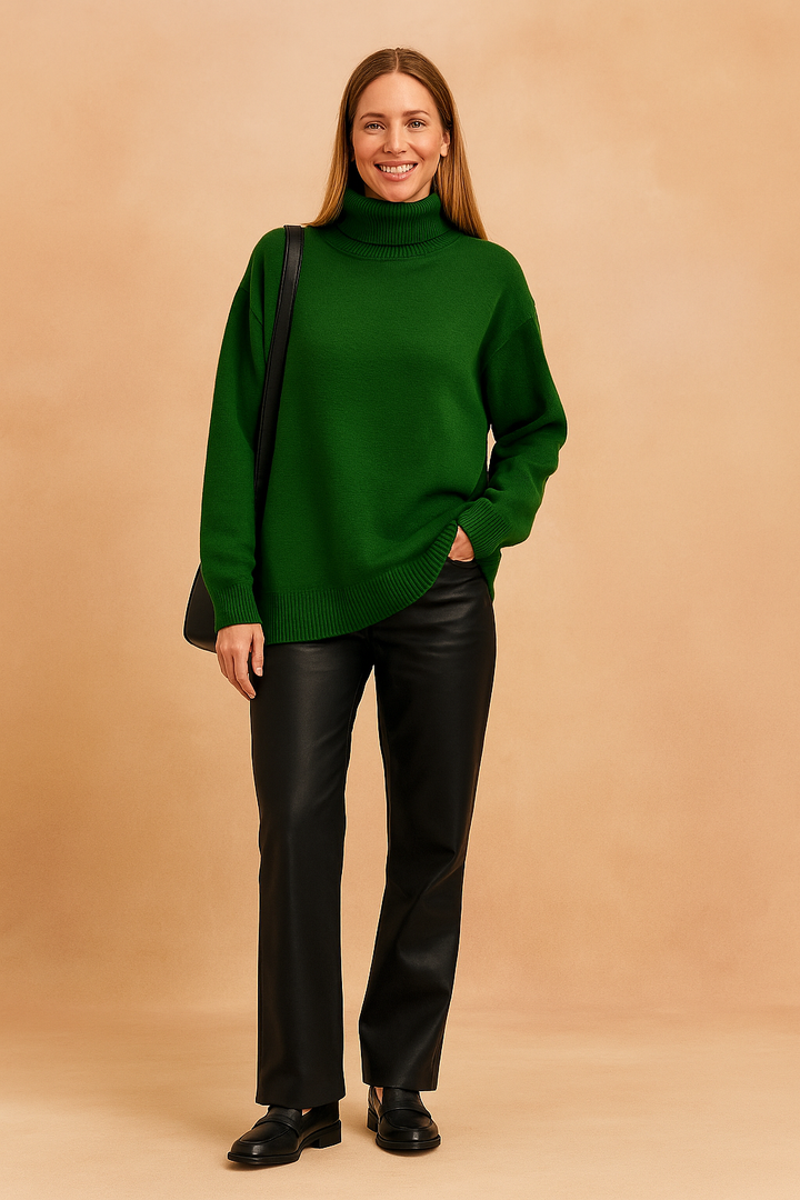 Billowy loose fit women's turtleneck sweater, offering comfortable style and a relaxed silhouette.