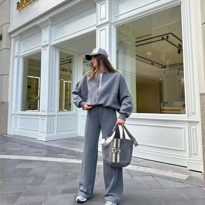 Comfortable women's tracksuit set, featuring a stylish top and pants for ultimate cozy loungewear.