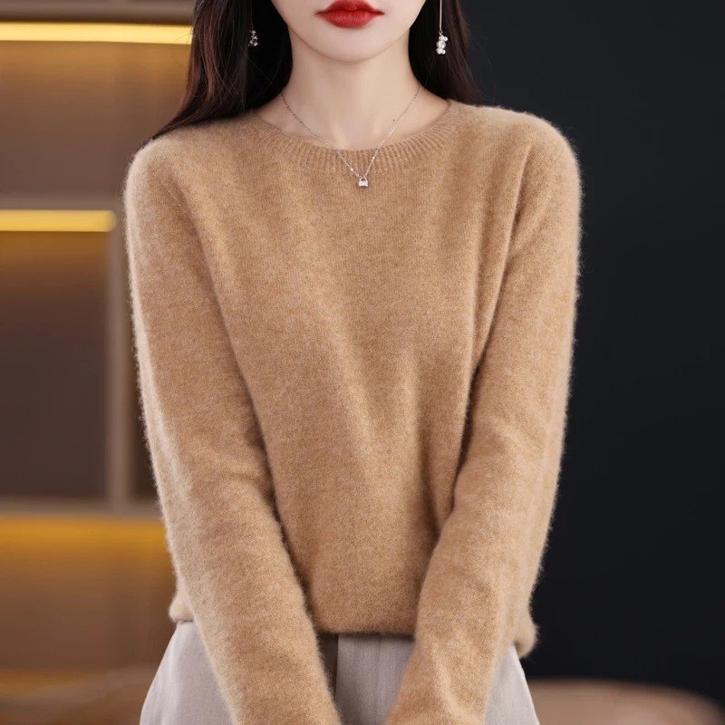 Women's cozy luxury round neck sweater, soft and warm for winter style.