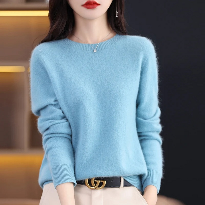 Elegant women's pullover, long sleeve round neck sweater for fall fashion.