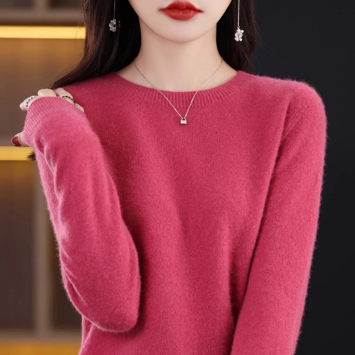 Cozy women's round neck sweater, elegant pullover for versatile everyday wear.