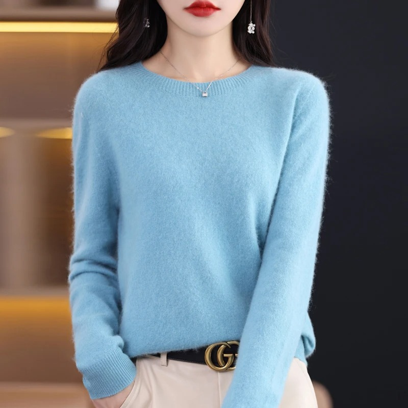 Warm women's luxury sweater, soft long sleeve pullover for fall fashion.