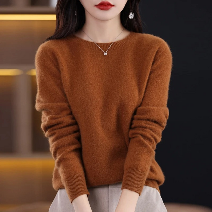 Elegant women's round neck pullover, cozy and warm for winter style comfort.