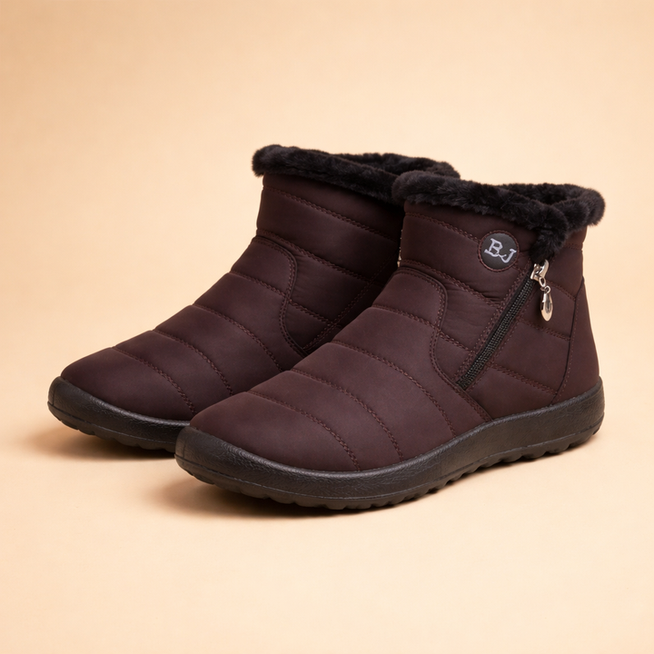 Warm & comfortable women's snow boots with non-slip sole, waterproof for cold winter adventures.