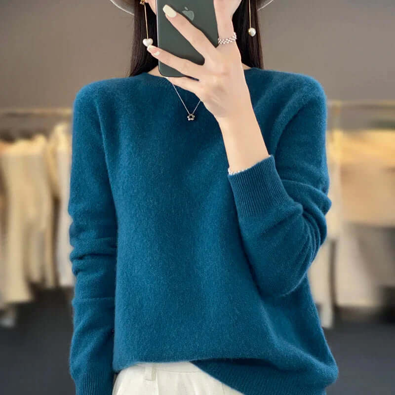 Women's soft O-neck sweater, comfortable knit, a perfect cozy top for layering.