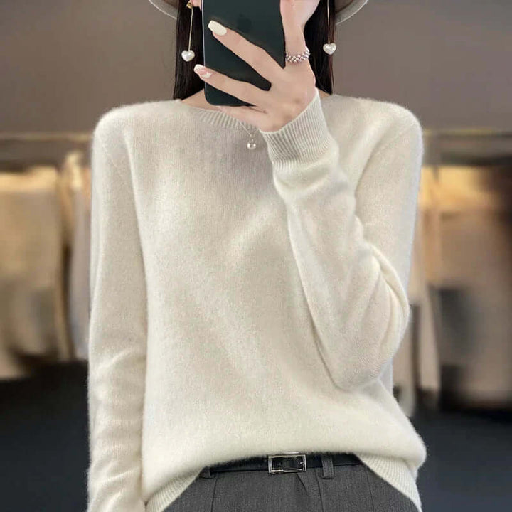 Women's stylish O-neck long sleeve top, a cozy knit jumper for winter layering.