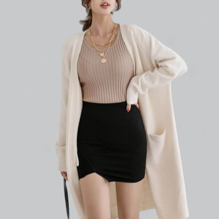 Soft women's oversized cardigan sweater, ideal for ultimate cozy comfort & relaxed style.
